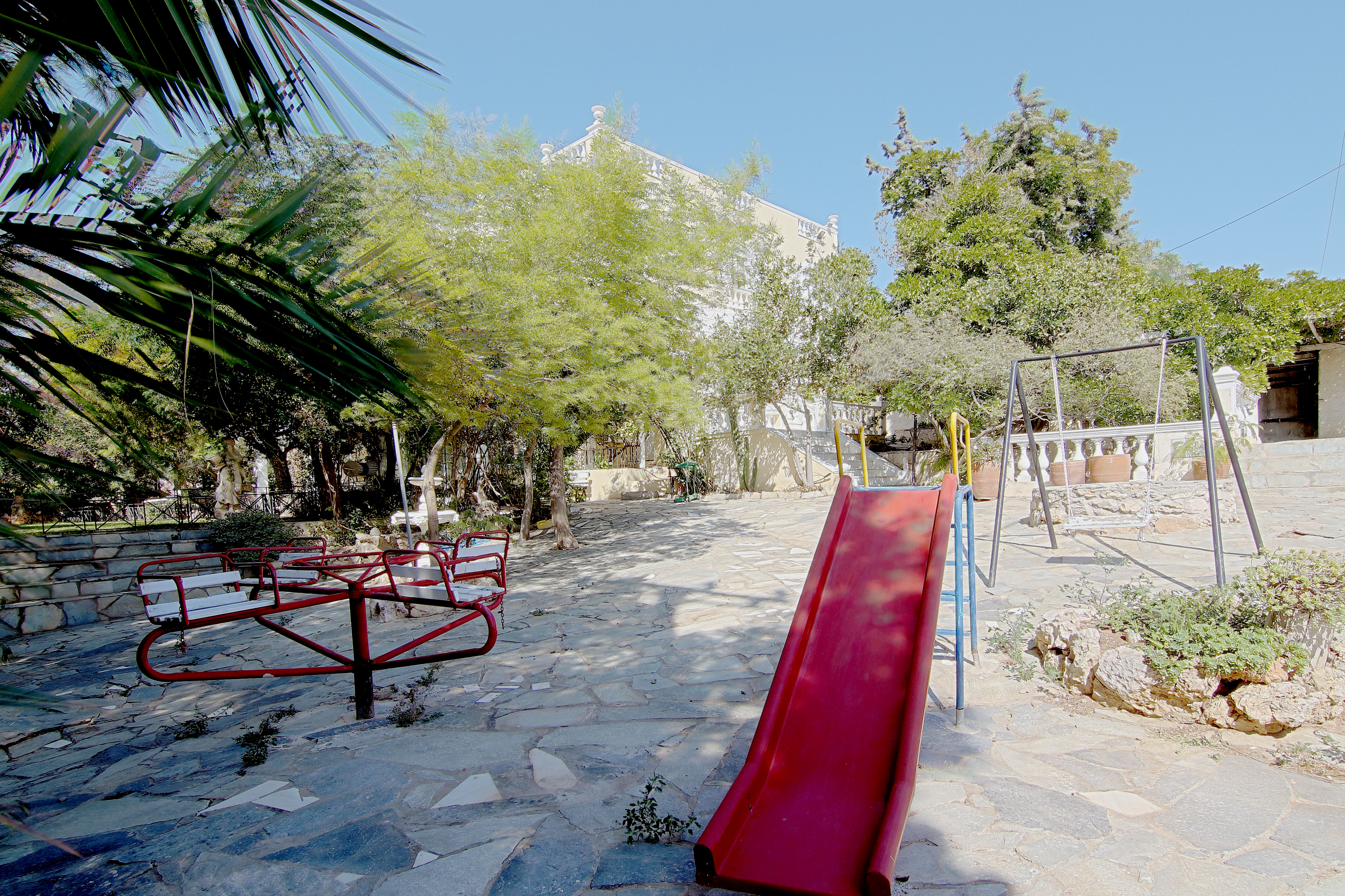 Children's playground with slide and swings