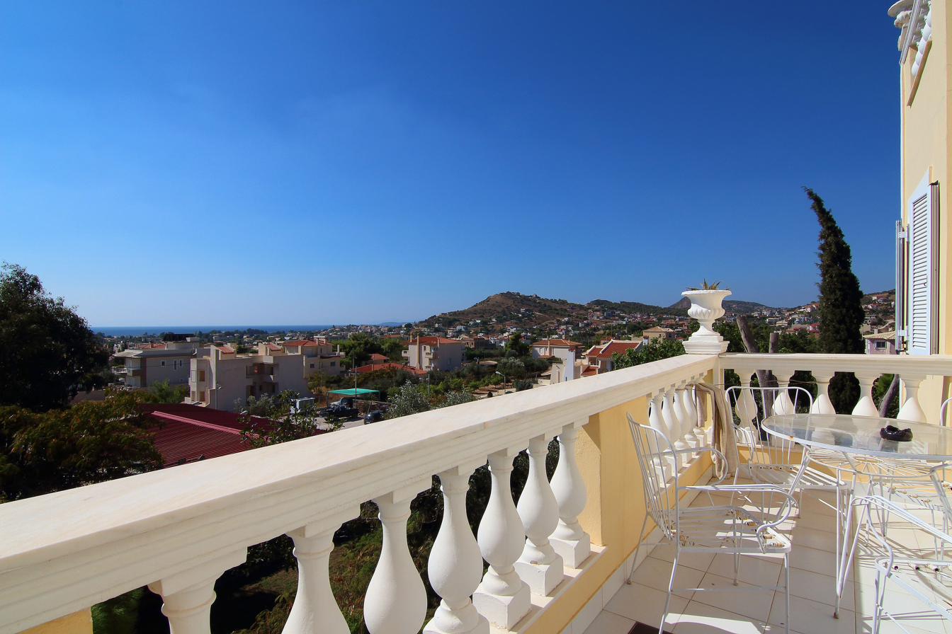View from the balcony over Lagonisi to the sea